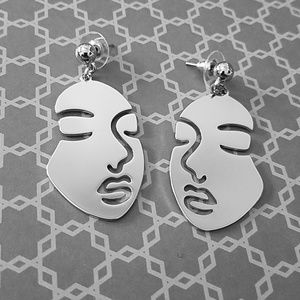 Abstract metal face earrings